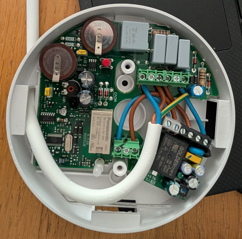 A picture of the Ei428 with a Sonoff Mini attached